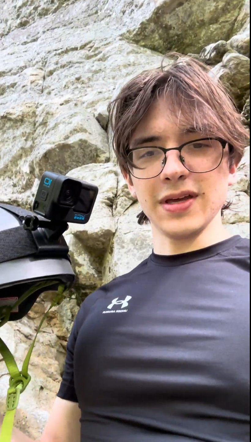 Alex filming YouTube content with a GoPro